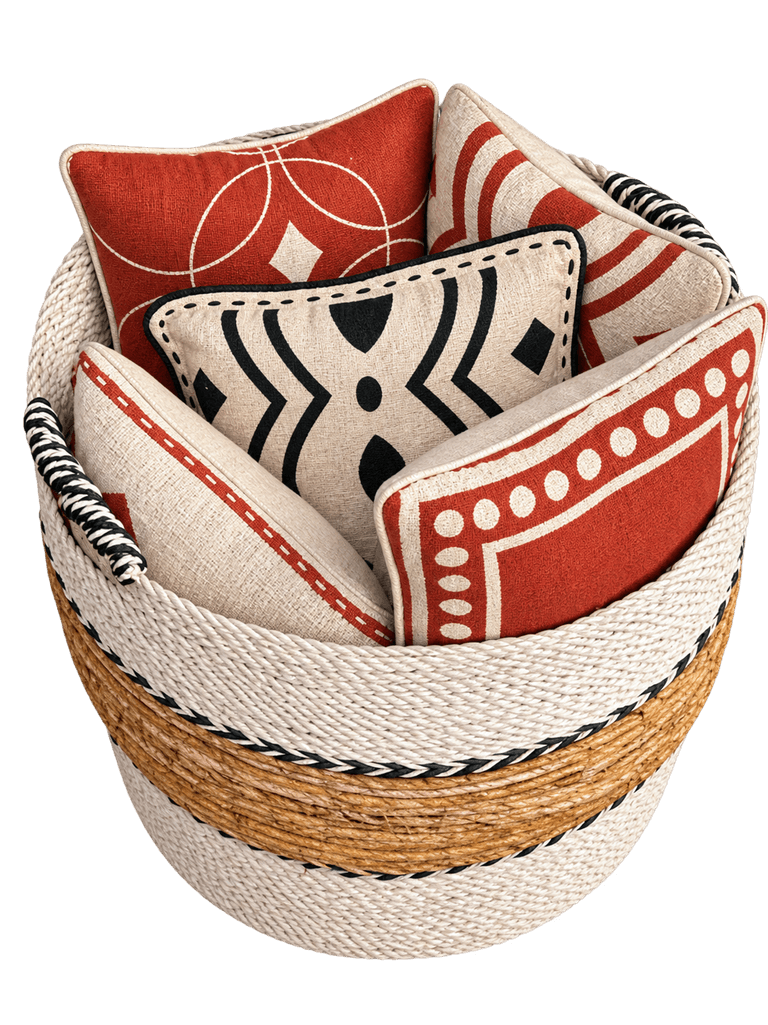 Basket of terracotta and black printed KIND cushions